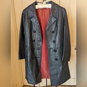 Black leather jacket with burgundy lining